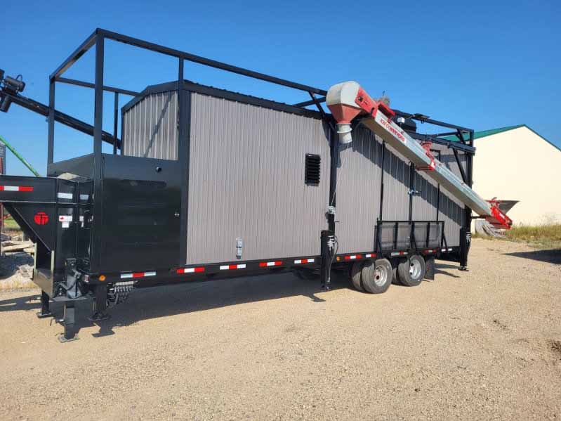 Mobile trailer exterior with deployed conveyance